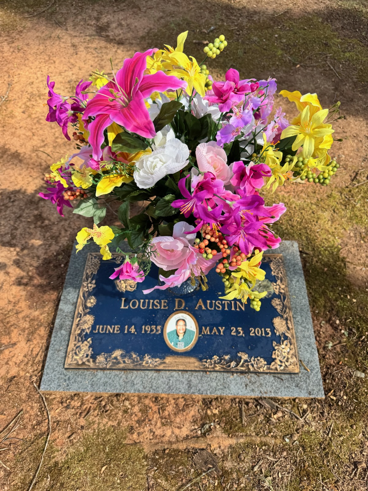 Beautiful flowers placed on Louise's grave by Catherine
